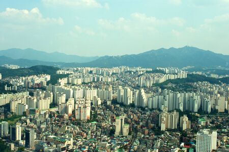 Seoul city street view from top in summer in Korea toned in blue-green