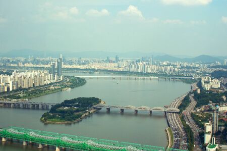 Seoul city street view from top in summer in Korea toned in blue-green