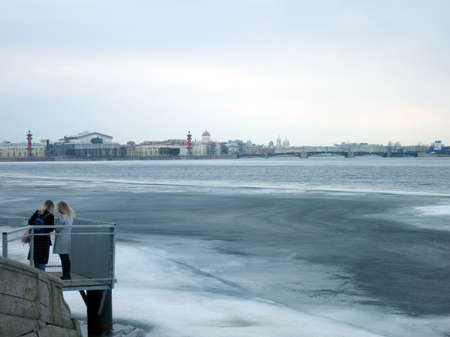 St Petersburg, Russia, March 29, 2021 View from the Neva embankment to Vasilievsky Island and Rosstralny columnsのeditorial素材