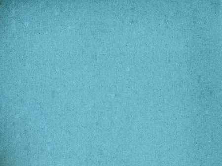 Blue old craft paper with dark edgeの写真素材