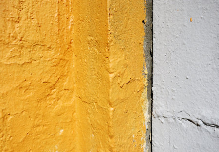 Abstract yellow gray urban wall backgroundの写真素材