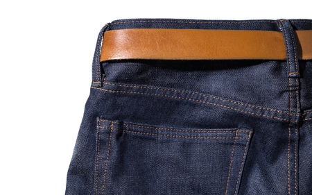 Denim jeans with belt on white isolated backgroundの写真素材