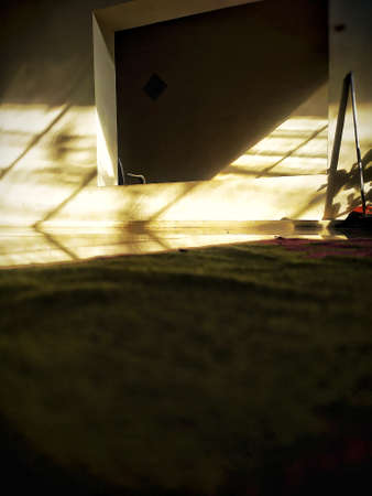 Sunlight enters through the balcony of a terrace in house.の写真素材