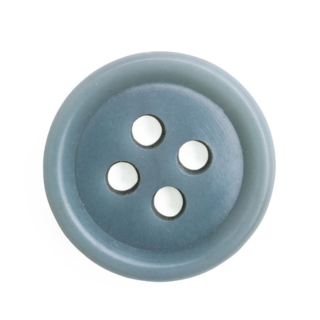Plastic cloth button closeup on white backgroundの写真素材