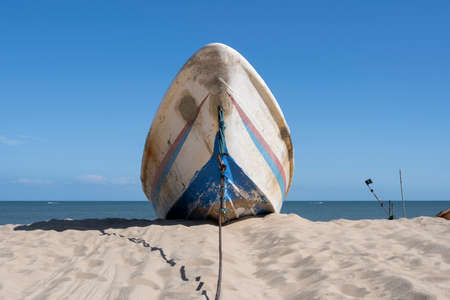 Boats on the beach under the Blue Skyの写真素材