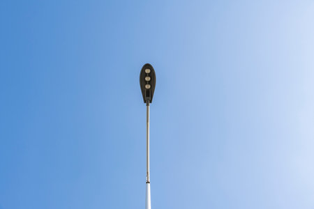 The city street lights are under the blue sky.の写真素材