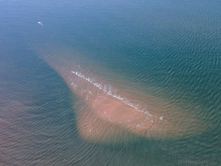 Aerial photograph of the beach and the blue sea