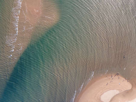 Aerial photograph of the beach and the blue seaの写真素材