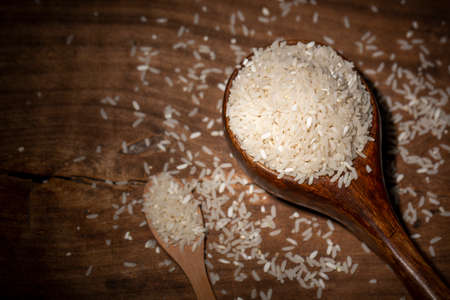 The rice is on the wooden tableの写真素材