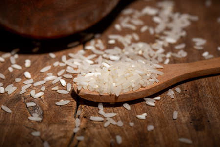 The rice is on the wooden tableの写真素材