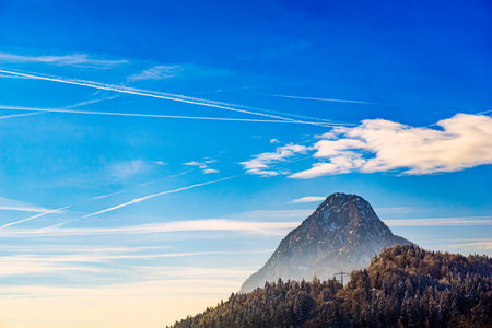 Tangent towers in mountains, high voltage power line pylons, power supply