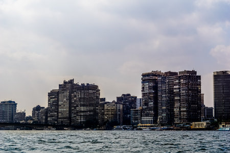 A stunningly serene view of Cairos magnificent skyline, with the beautiful Nile River flowing in the...