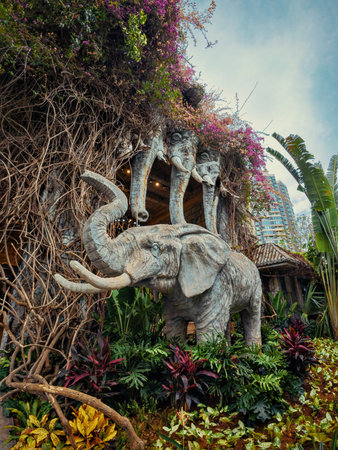 Elephant sculpture in the garden, Chiang Mai, Thailand.の写真素材