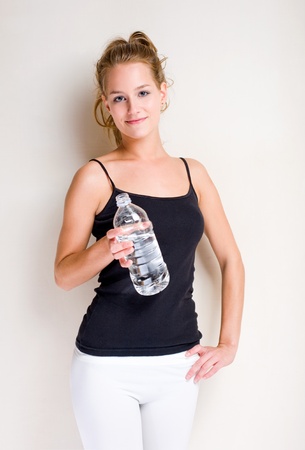 Portrait of a beautiful young blond fitness woman.の写真素材