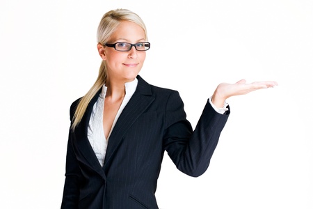 My offer, portrait of a beautiful young blond business woman holding out the palm of her hand.の写真素材