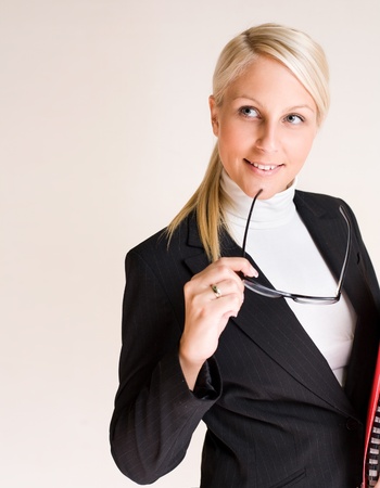 Portrait of attractive friendly thoughtful business woman.の写真素材