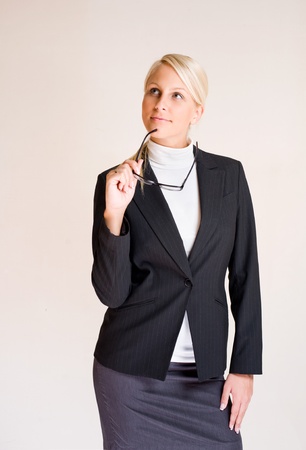 Portrait of attractive friendly thoughtful business woman.の写真素材