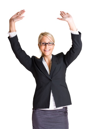 Portrait of exuberant gesturing young business woman with hands raised, isolated on white background.の写真素材