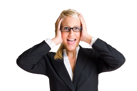 Portrait of beautiful young business woman with surprised expression isolated on white background.の写真素材