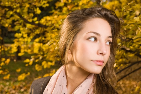 Closeup portrait of gorgeous autumn fashion girl.の写真素材