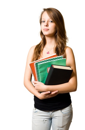 Young student girl with serious facial expression, isolated on white.の写真素材