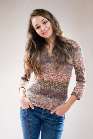Portrait of a fashinalble beautiful young friendly brunette.の写真素材