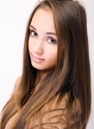 Closeup portrait of gorgeous brunette teen girl.の写真素材