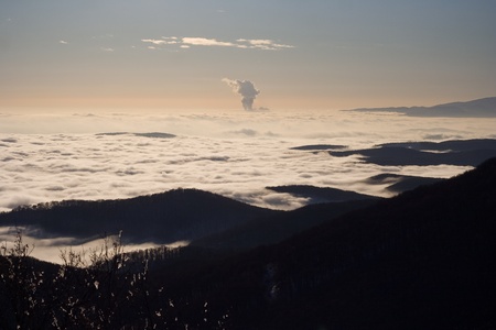 Winter landscape from a vista point above the clouds.の写真素材