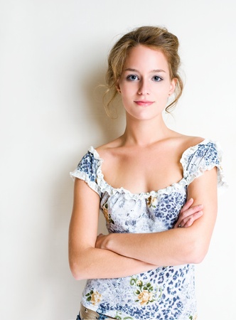 Half length portrait of a confidnt beautiful friendly blond woman.の写真素材