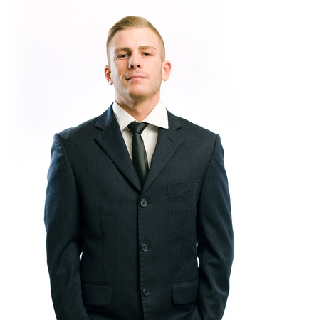 Portrait of a proud young businessman isolated on white.の写真素材