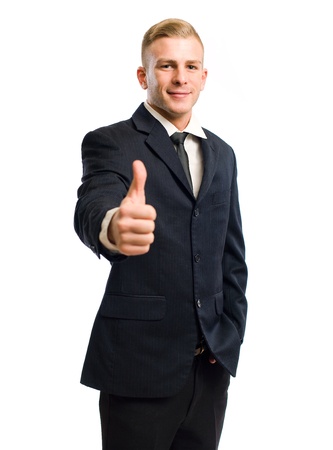 Portrait of a confident young businessman gesturing thumbs up.の写真素材