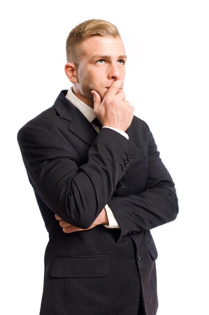 Portrait of a handsome young businessman, thinking.の写真素材