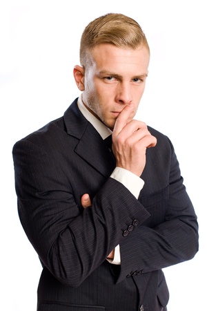 Half length portrait of a thoughtful young businessman.の写真素材