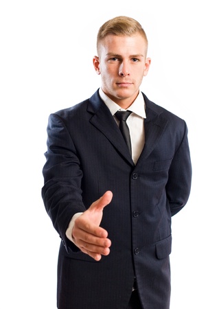 Half length portrait of an elegant young businessman doing introductions.の写真素材