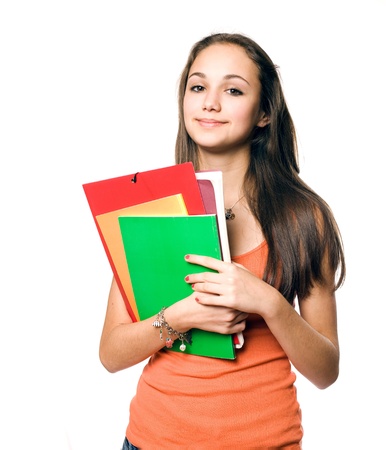 Portrait of a gorgeous young brunette student isolated on white background.の写真素材