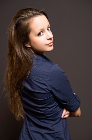 Half length portrait of an attractive young brunette woman.の写真素材