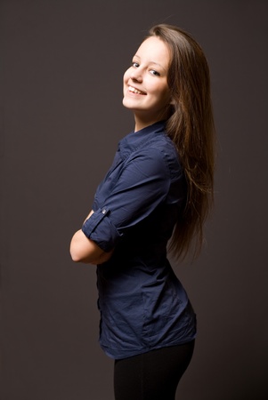 Half length portrait of an attractive young brunette woman.の写真素材