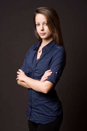 Half length portrait of an attractive young brunette woman.の写真素材
