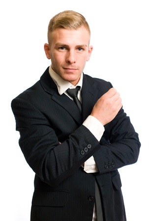 Portrait of a confident young businessman with thoughtful gesture の写真素材