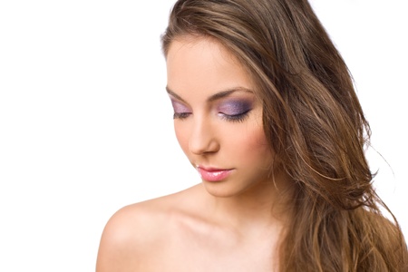 Gorgeous young brunette in elegant colorful makeup.の写真素材