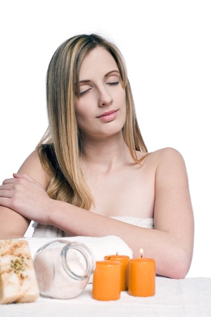 Portrait of gorgeous blond wellness girl with spa accessories の写真素材