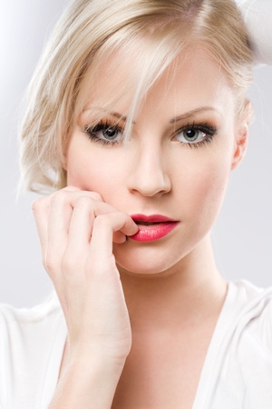 Portrait of a sensual seductive young blond woman.の写真素材