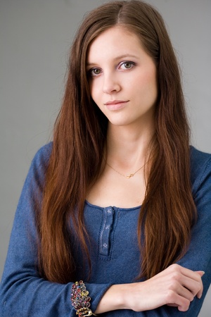 Beautiful long haired young brunette woman の写真素材