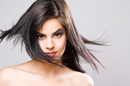 Beauty portrait of a gorgeous young brunette woman.の写真素材