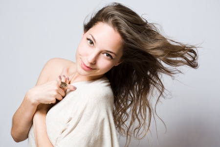 Portrait of a beautiful cute young brunette.の写真素材