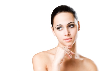Beauty shot of a gorgeous thoughtful young brunette woman の写真素材