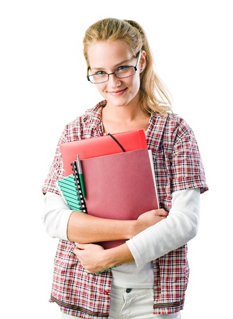Portrait of a gorgeous confident young student woman holding exercise books.の写真素材