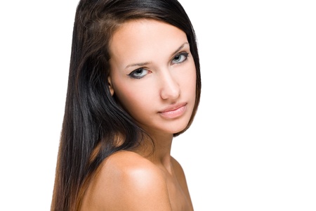 Portrait of a tanned brunette beauty isolated on white background.の写真素材