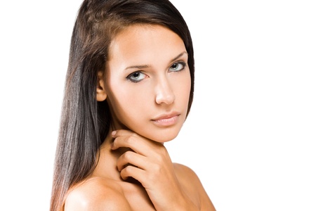 Portrait of a beautiful tanned young brunette woman.の写真素材