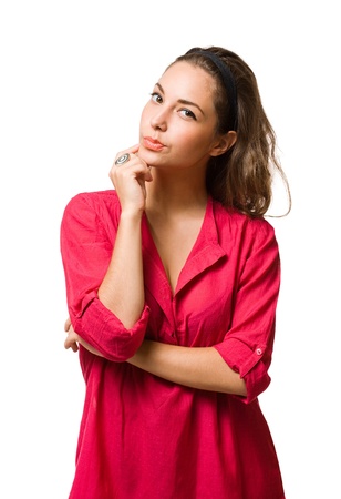 Portrait of a beautiful pensive young brunette woman.の写真素材